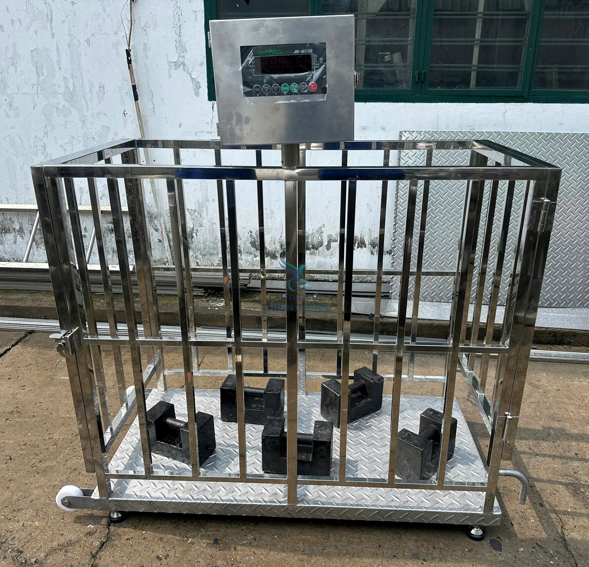 Cân điện tử lồng heo inox có bánh xe.