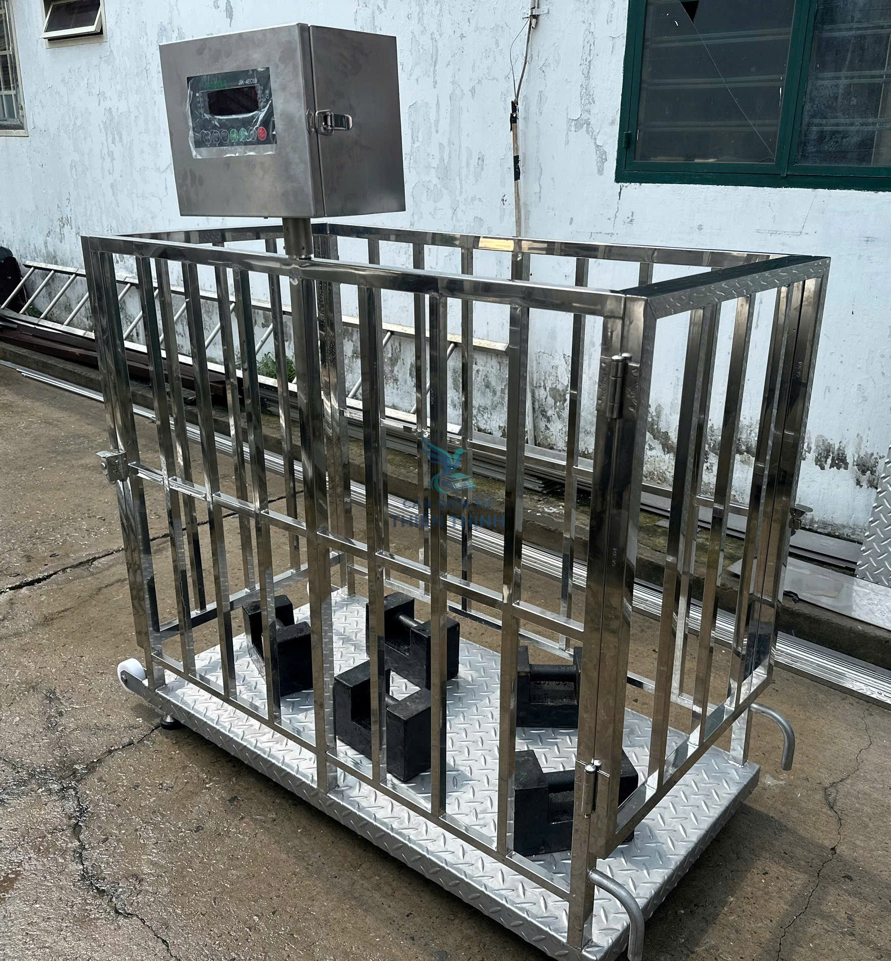 Cân điện tử lồng heo inox có bánh xe.