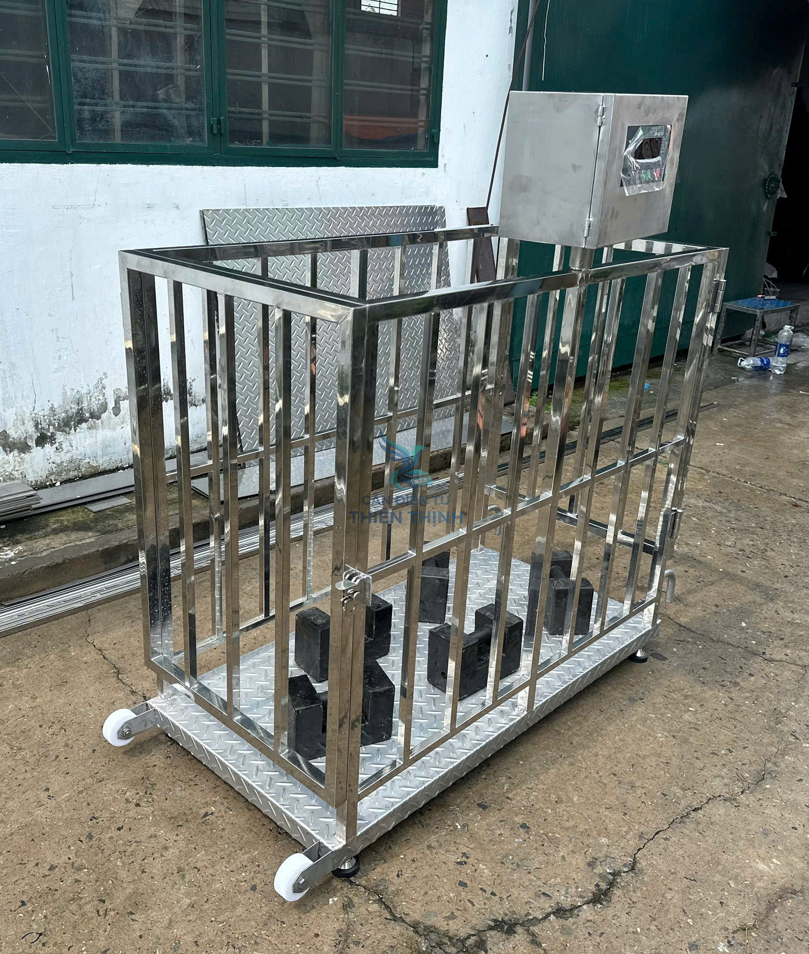 Cân điện tử lồng heo inox có bánh xe.